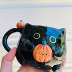 Black cat mug with pumpkin friends