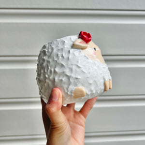 Flowery sheep pot