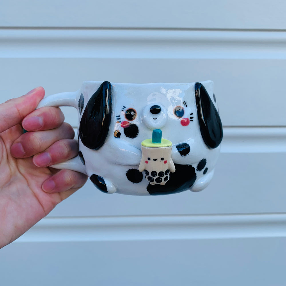 Black and white spotty doggo with bubble tea mug, photo 8 of 10