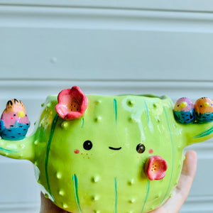 Flowery cactus pot with bird friends