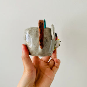 Koala with cockatoo friend mug