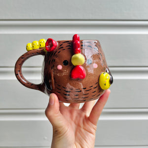 Brown chicken mug with chicks