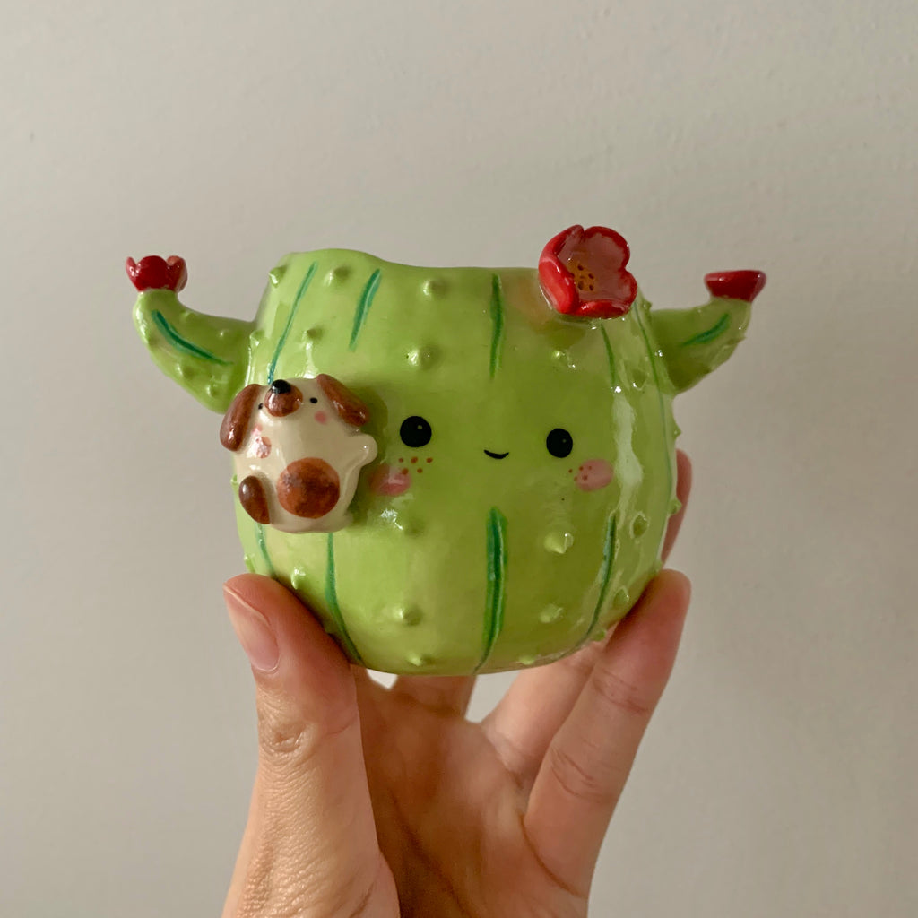 Flowery cactus pot with doggo friend