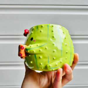 Flowery cactus pot with mug friend