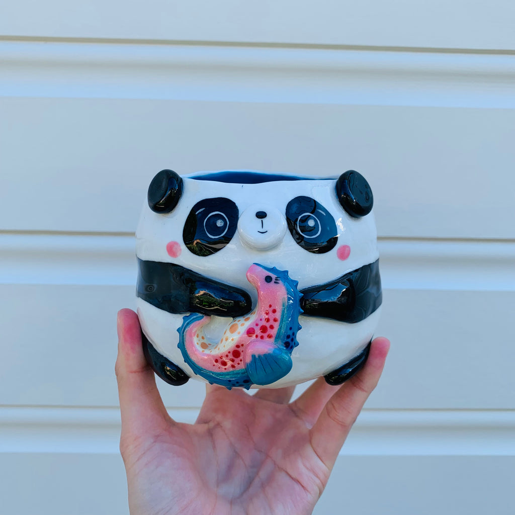 Big panda with seahorse friend planter