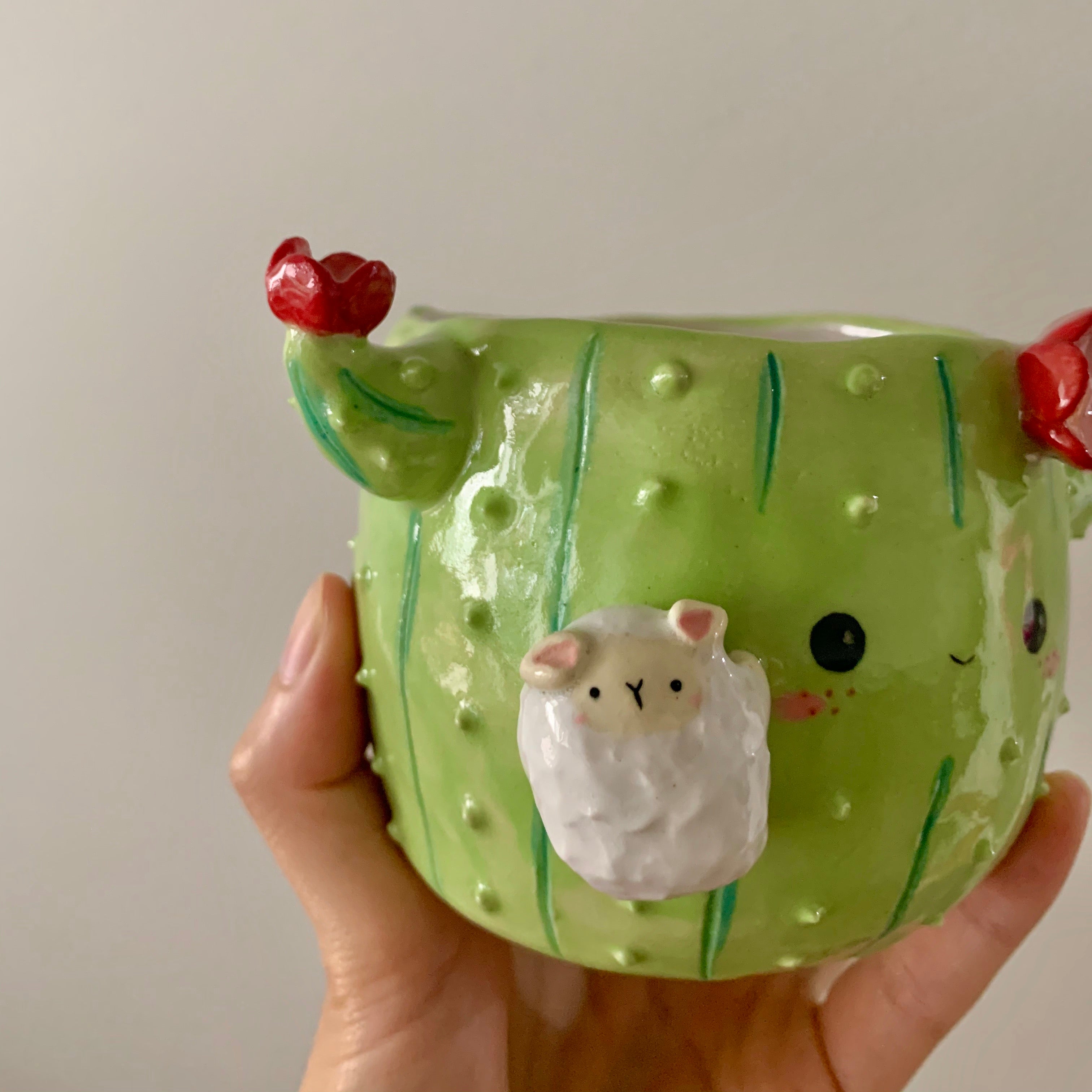 Flowery cactus pot with lamby friend