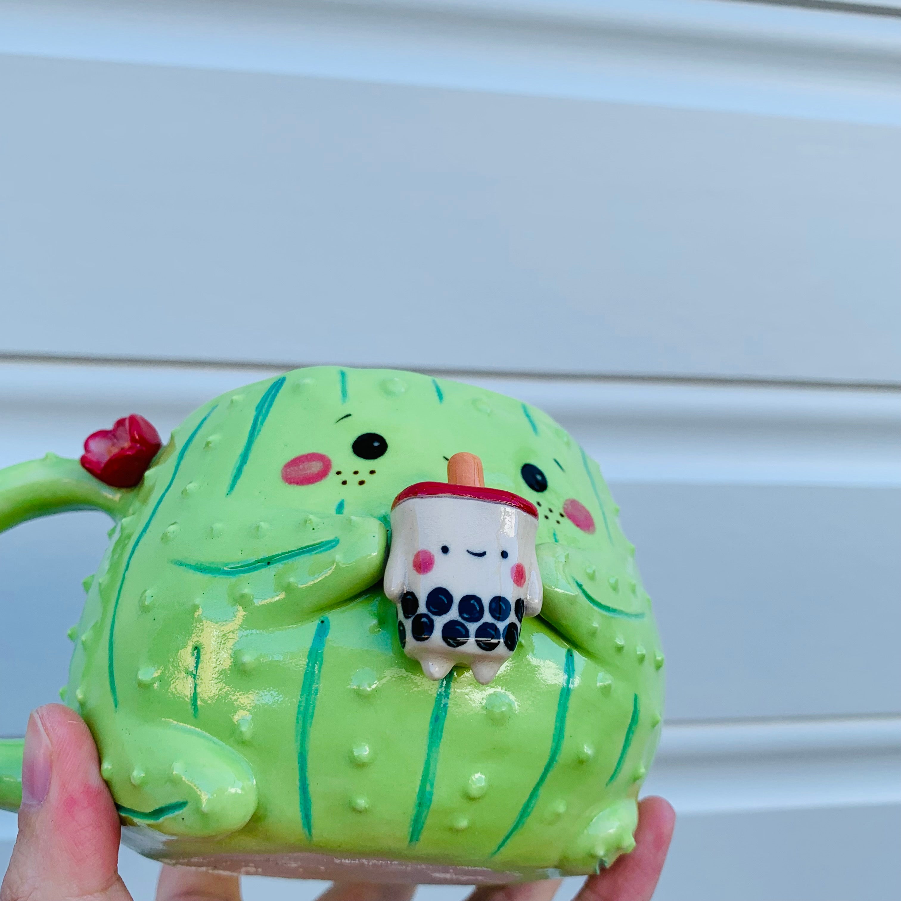 Light green flowery cactus mug with bubble tea friend