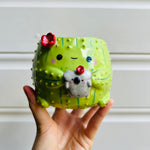 SECONDS: Flowery cactus pot with koala friend