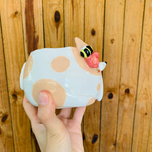 Cream spotty doggo pot with bee friends