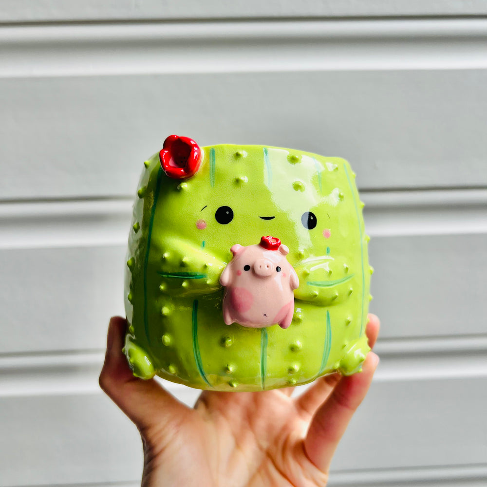 Flowery Cactus pot with pig friend, photo 1 of 6