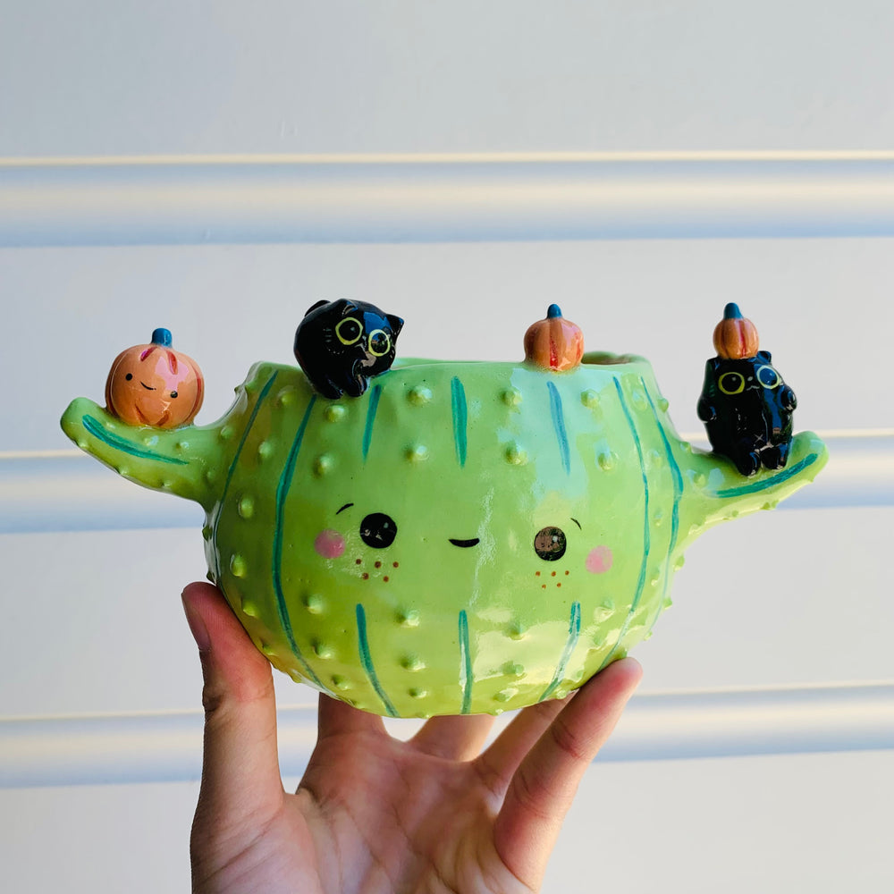 Pumpkin cactus pot with black cat friends, photo 1 of 5