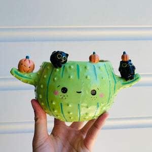 Pumpkin cactus pot with black cat friends