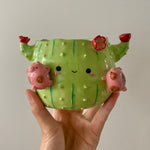 Flowery cactus pot with pig friends