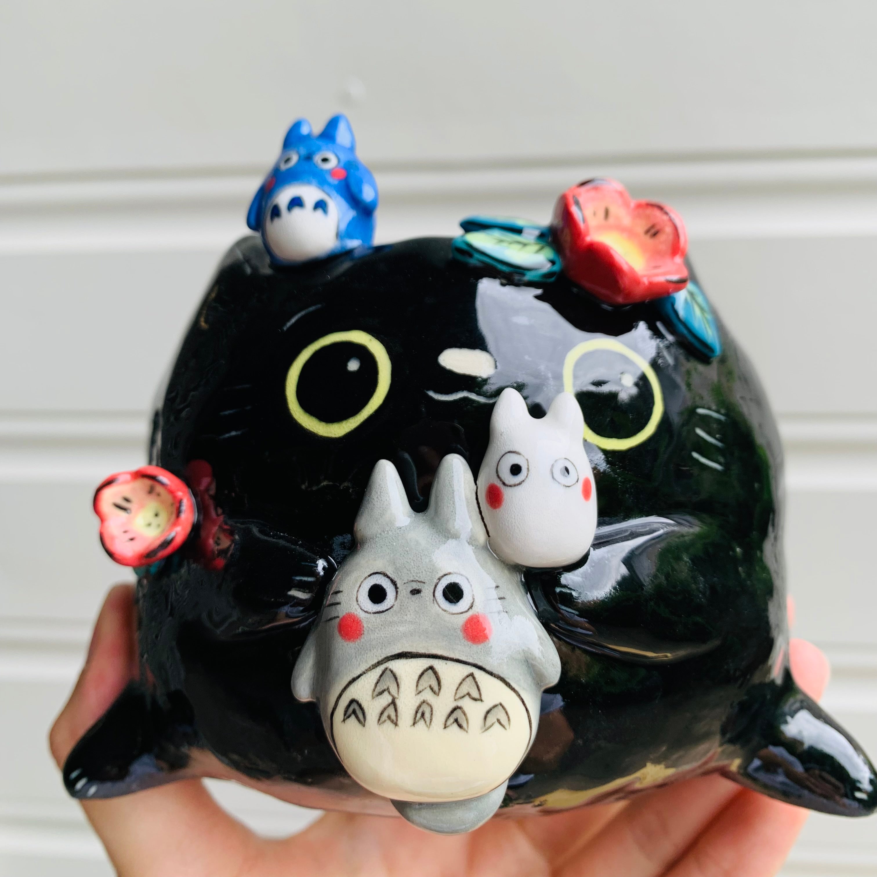 Flowery black cat pot with Totoro friends