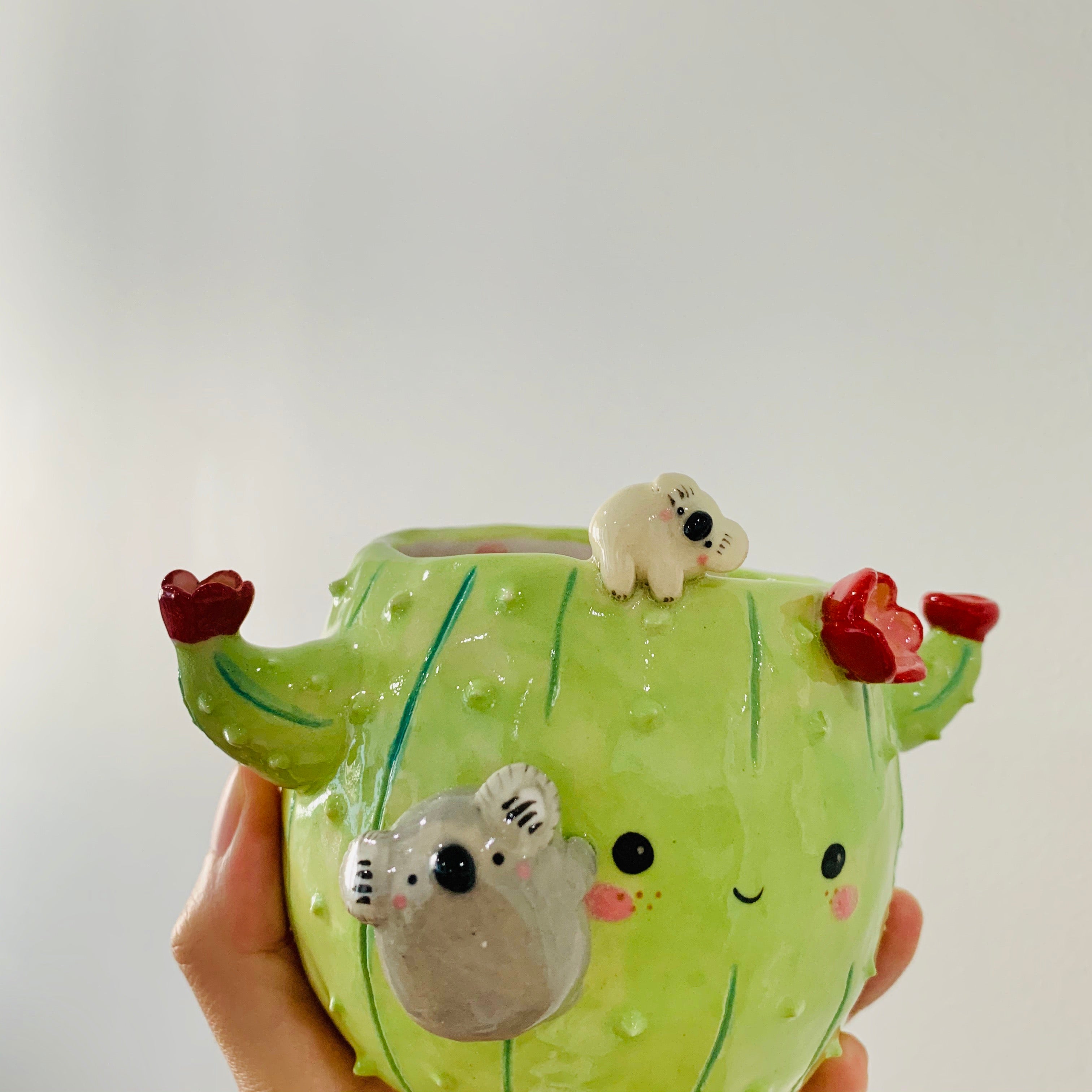 Flowery cactus pot with koala friends