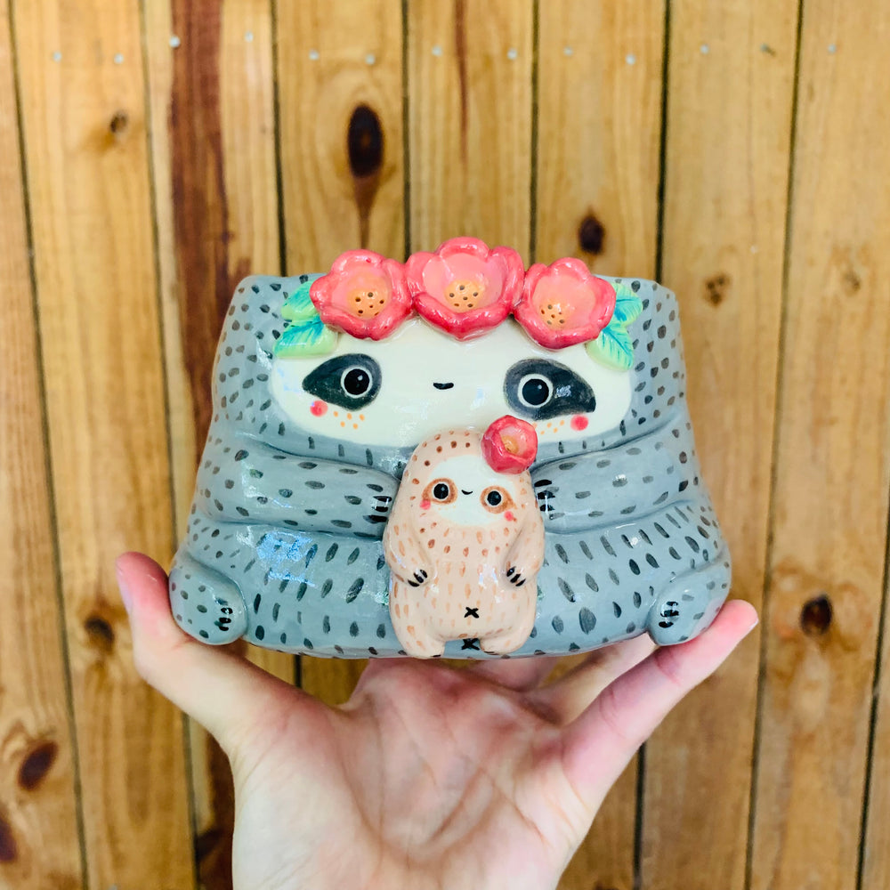 Flowery crown mama and baby sloth pot, photo 1 of 9