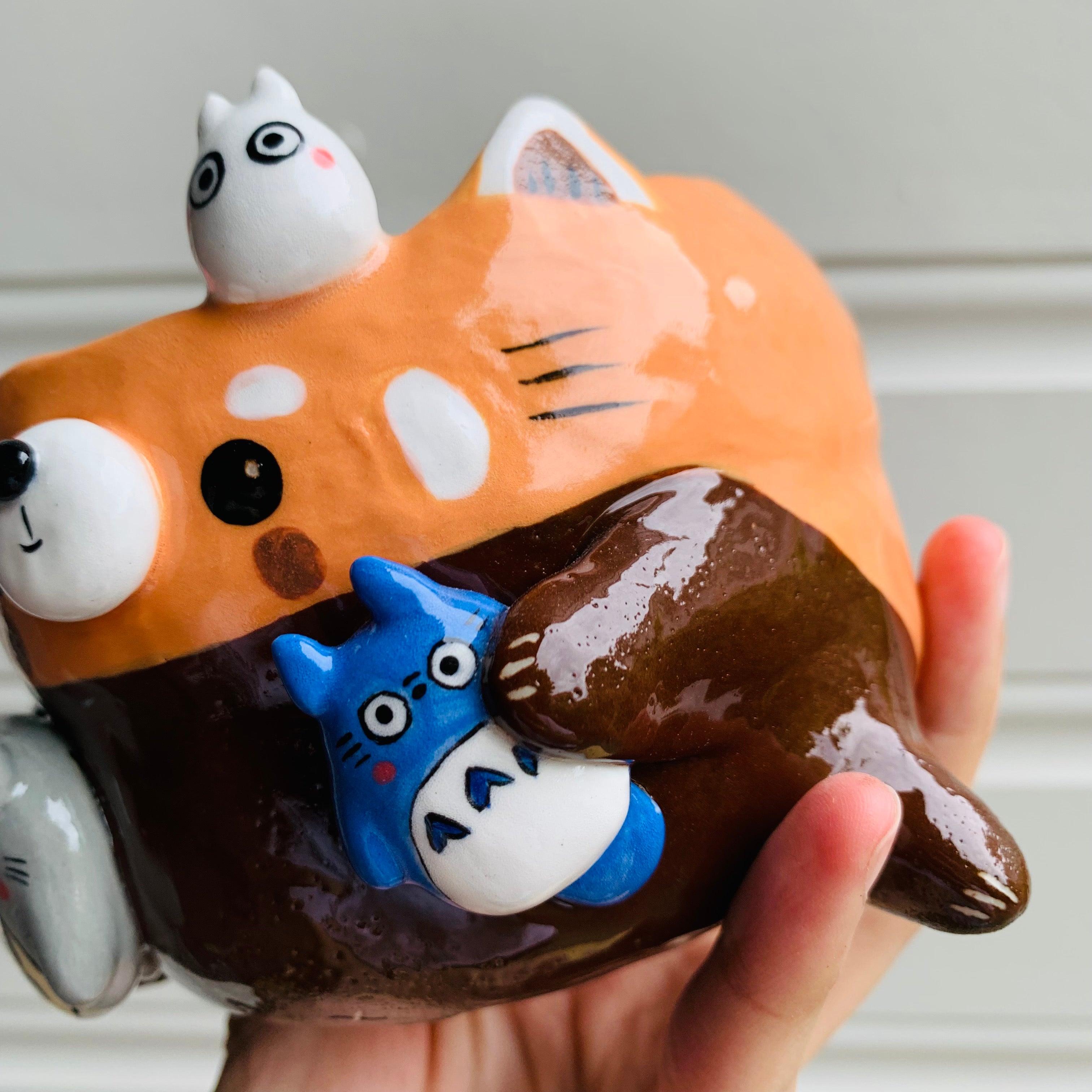 Red panda pot with Totoro friends