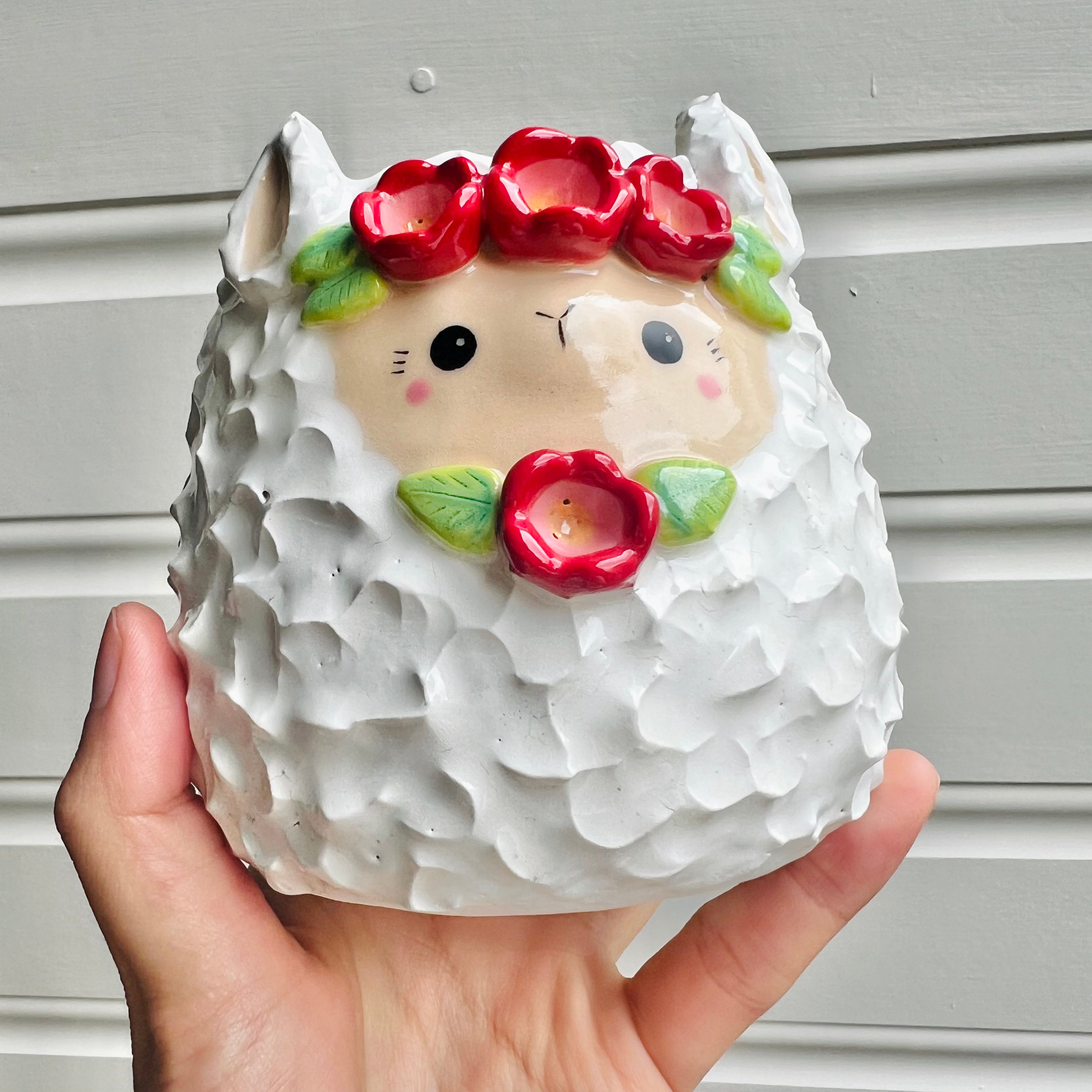 Flowery llama pot