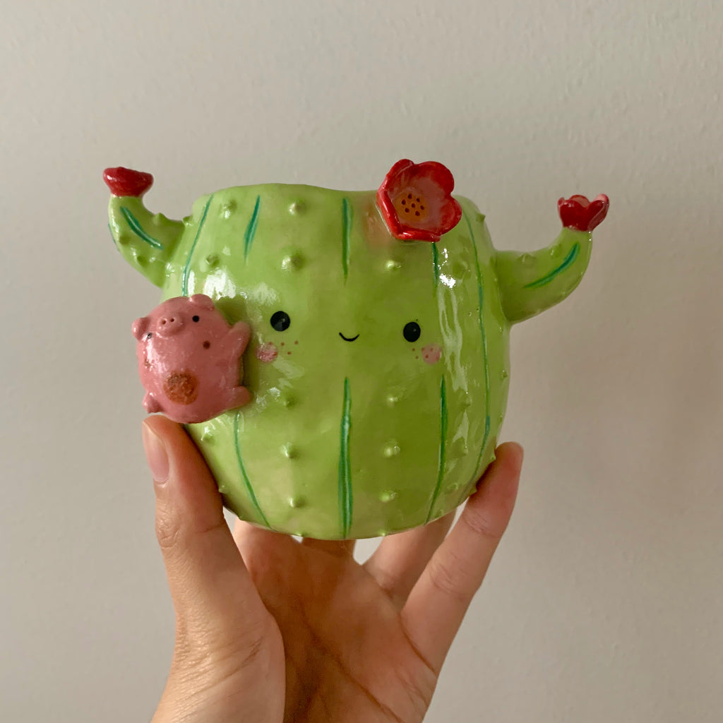 Flowery cactus pot with pig friend