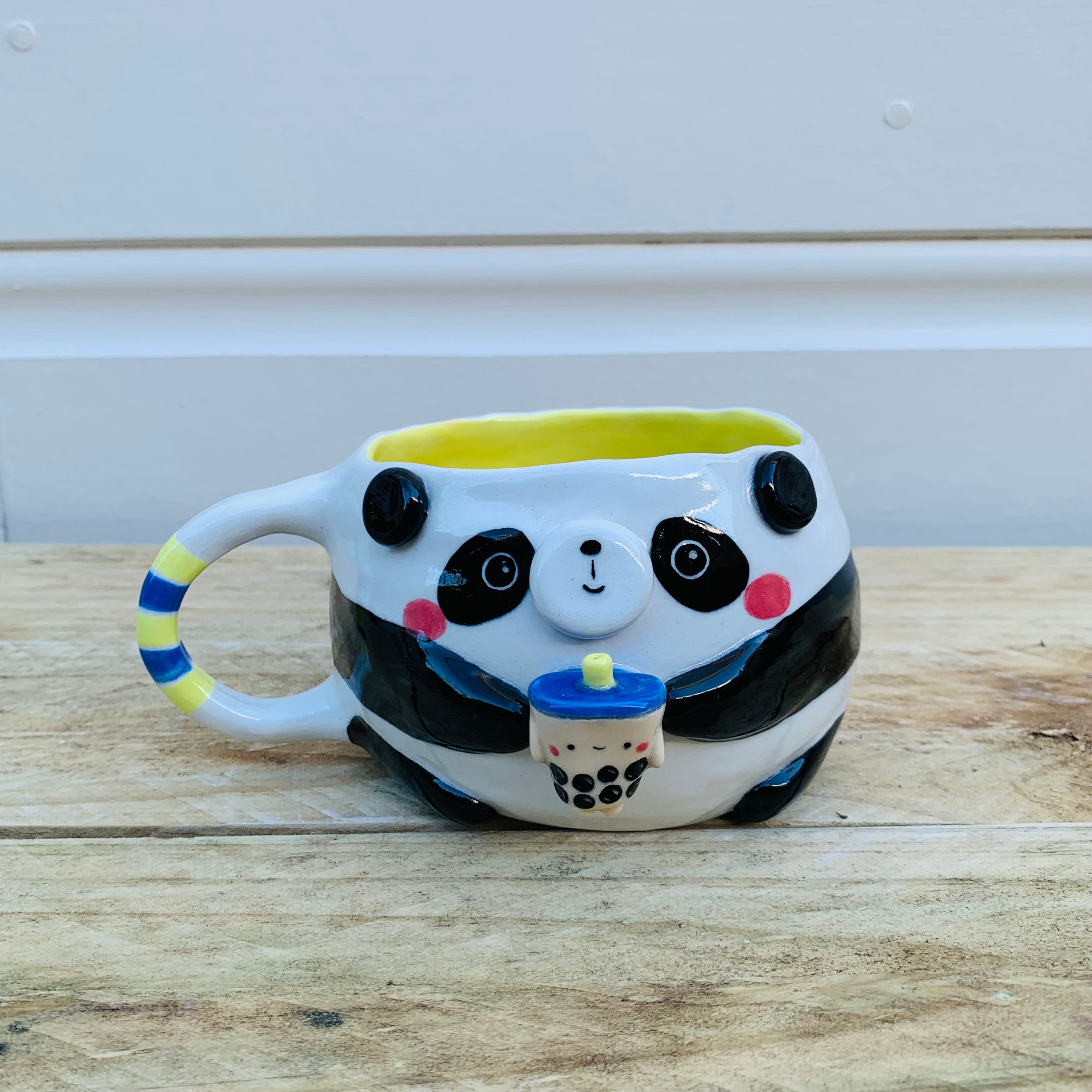 Panda with green/yellow bubble tea mug