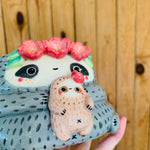 Flowery crown mama and baby sloth pot