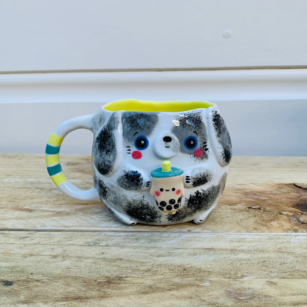 Spotty doggo with bubble tea mug