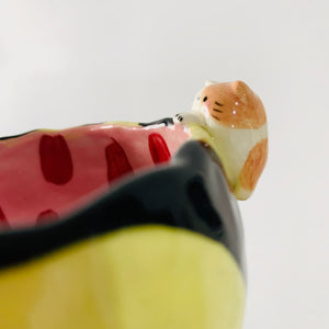 Flowery bee snack bowl with cat friend