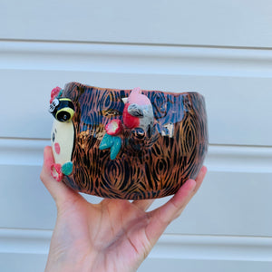 Happy flowery tree with bees, cat and pink galah planter